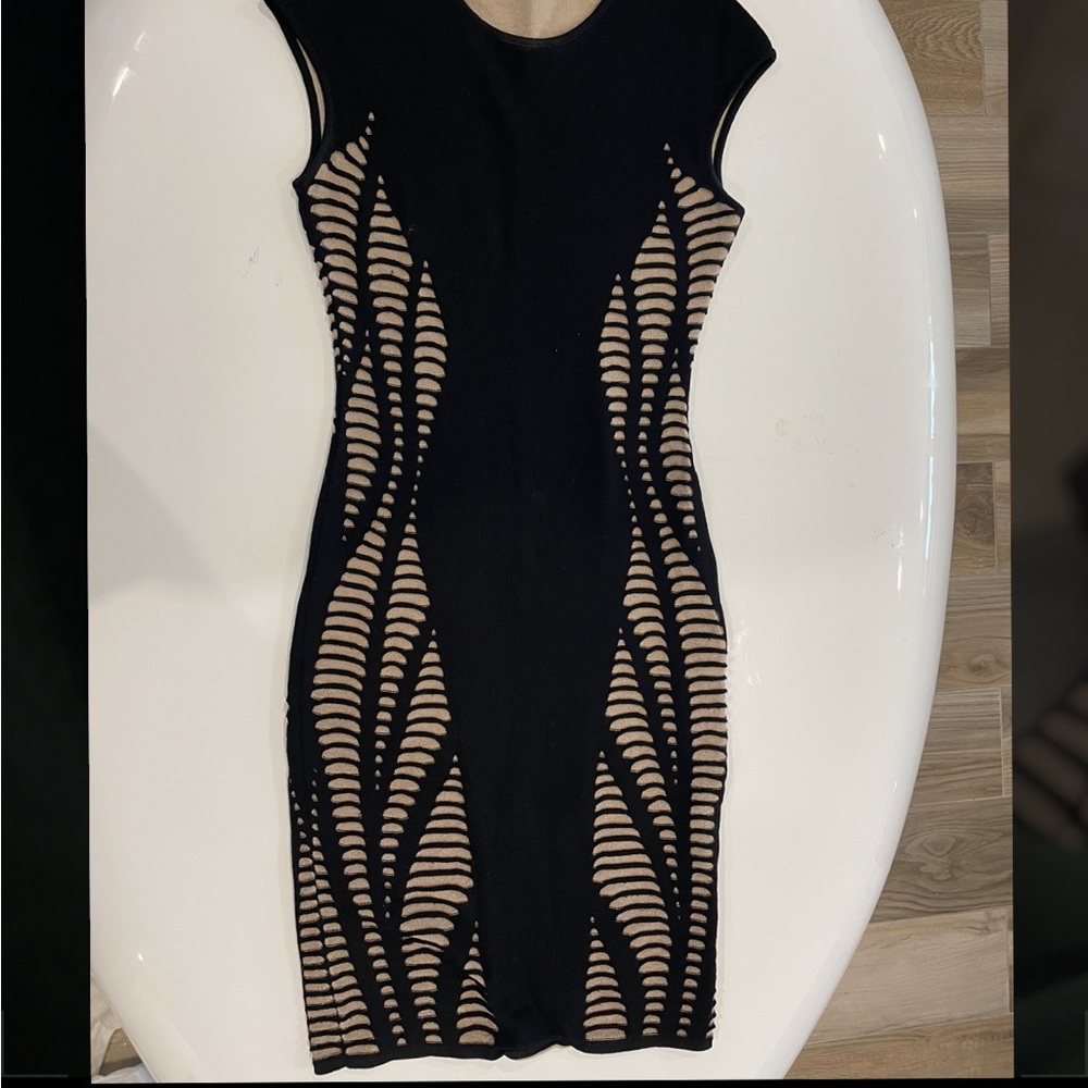 Black dress with nude cut outs. Size small. Company RVN